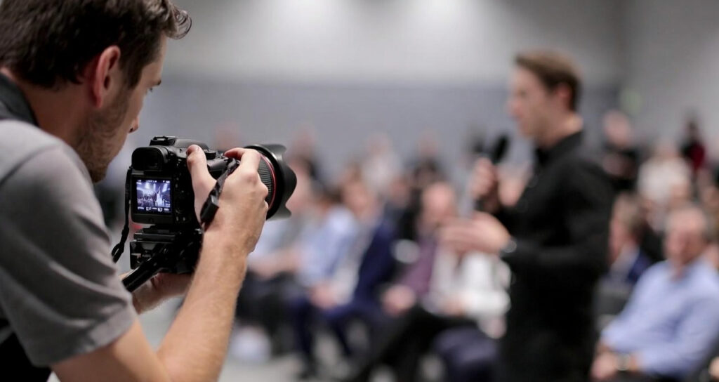 DMV Media filming speaker event.